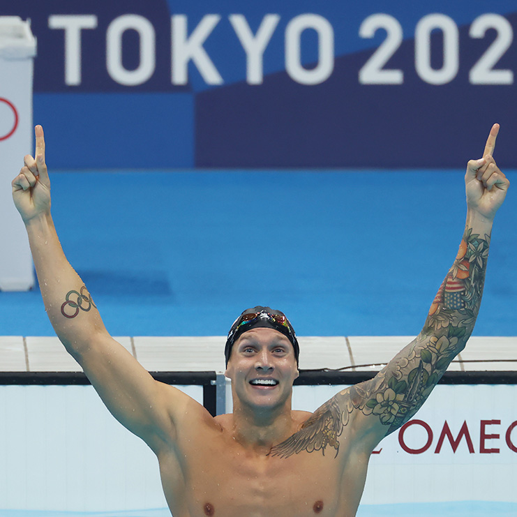 Caeleb Dressel reacts after winning the gold medal in the Men's 100m Freestyle Final at the Tokyo 2020 Olympic Games.