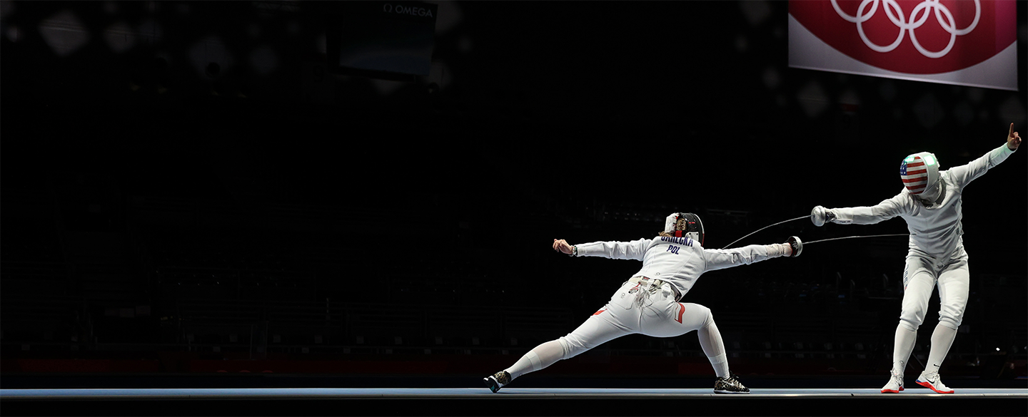 Aleksandra Jarecka of Team Poland competes against Kelley Hurley in Women's Épée Team Placement 5-6 at the Tokyo 2020 Olympic Games.
